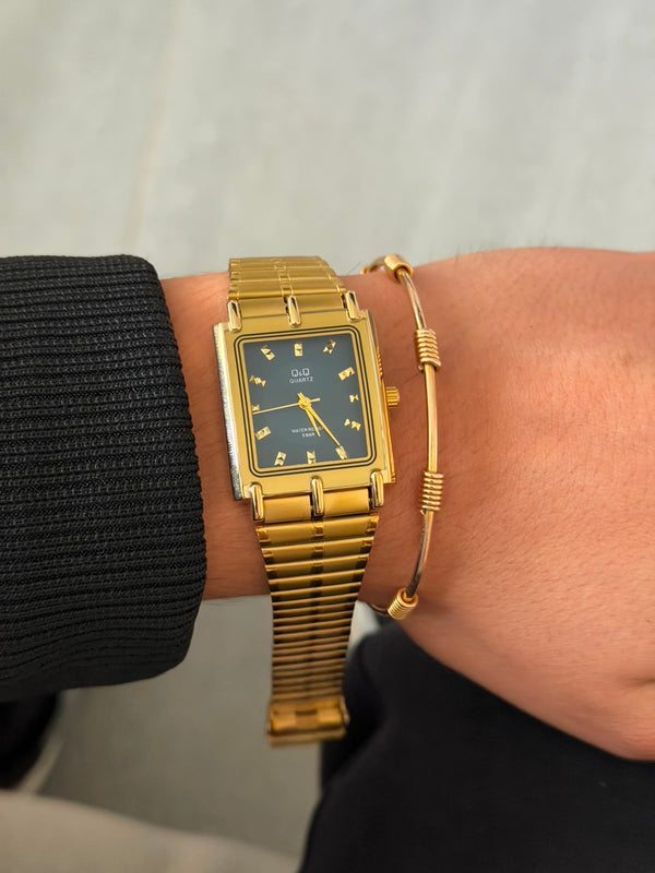 QYQ Gala Dorado Tablero Negro
