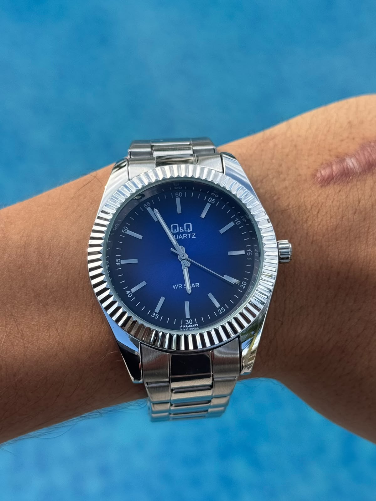QYQ B95 Plateado Tablero Azul