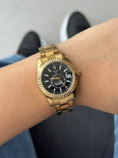 Rlx Sky Mujer Dorado Tablero Negro
