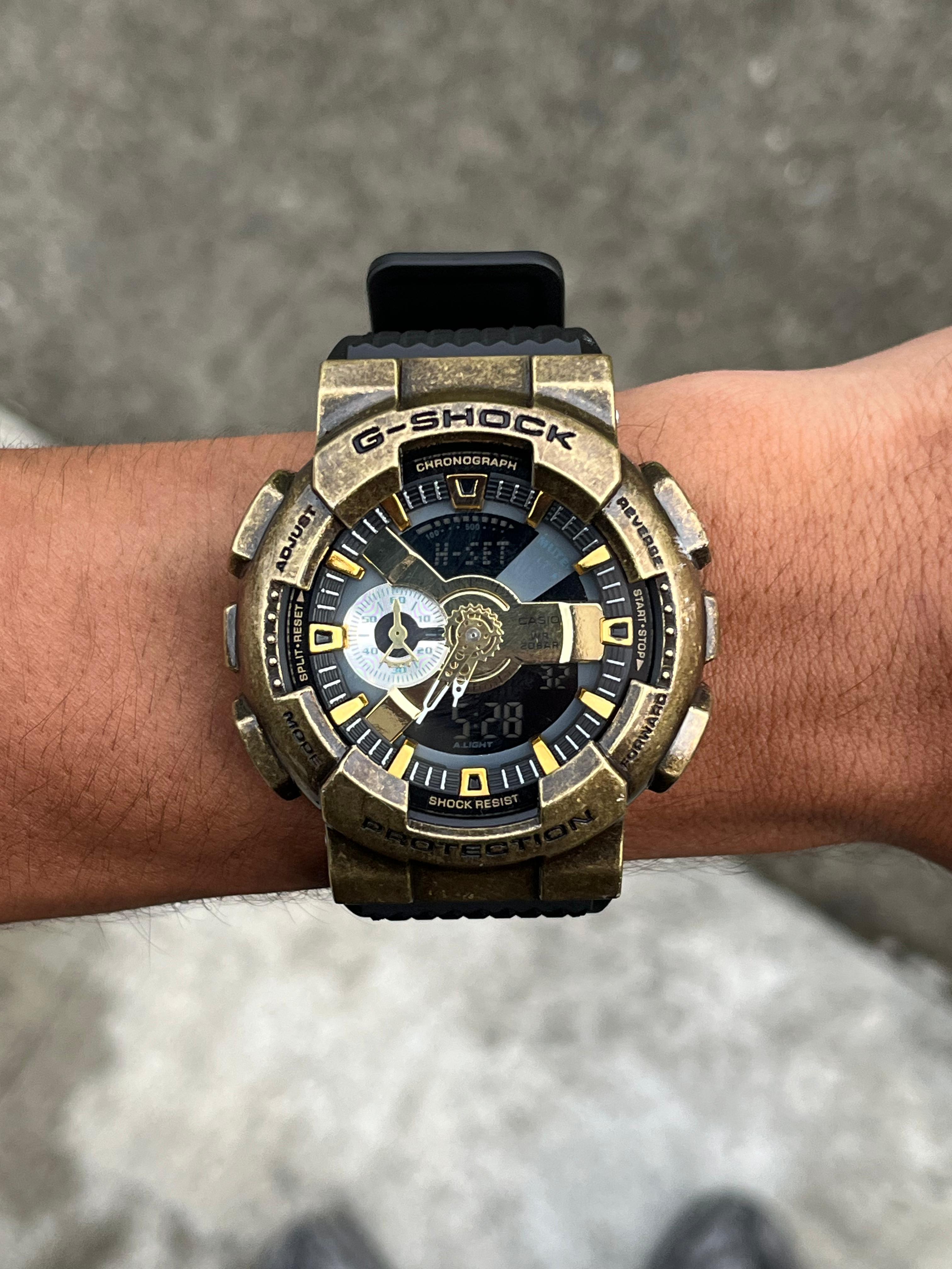 G-Shck GA-110 Metal Negro Tablero Dorado