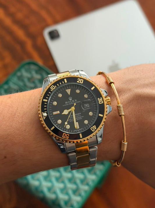 Rlx  Submariner Bicolor Dorado Tablero Negro Bisel Negro